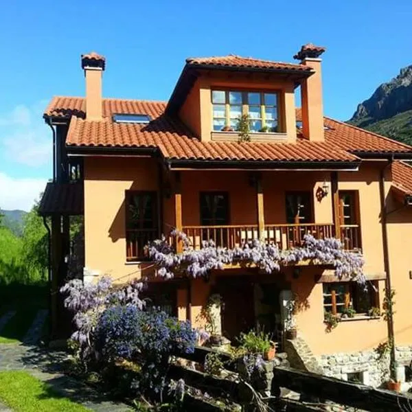 Apartamentos Rurales Buenamadre, hotel v destinaci Pola de Somiedo