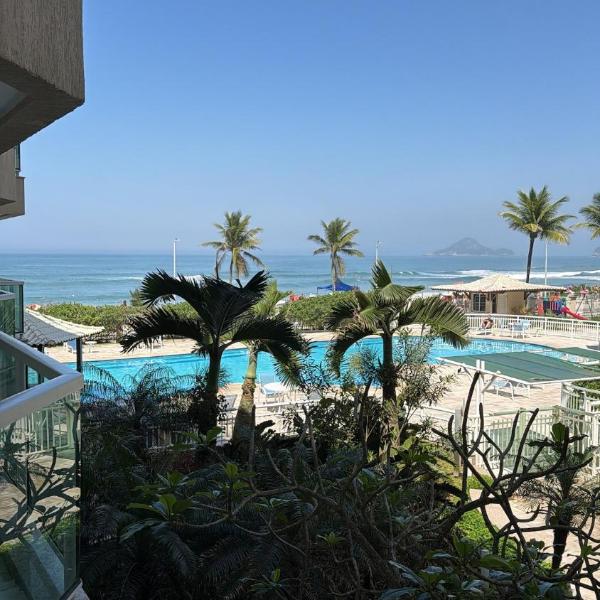 Flat pé na areia, vista mar