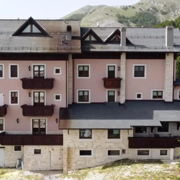 Principessa Giovanna Boutique Chalet, хотел в Рокарасо