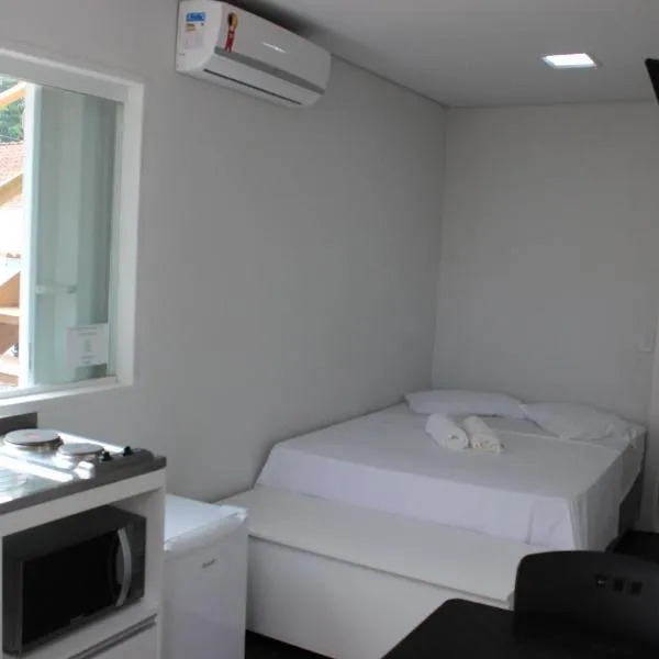 Praia Camburi - Studios Kuta, hotel in Camburi