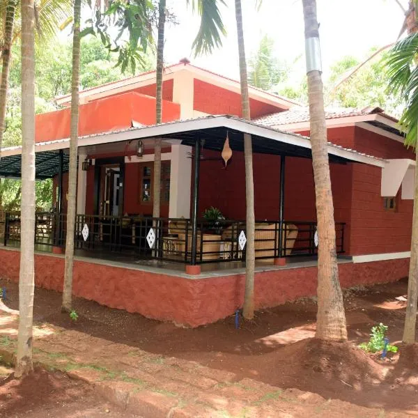 Red Roof Farmhouse, hotel en Chiplun