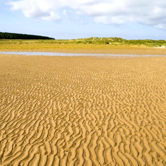 Kilometervis med sandstrender