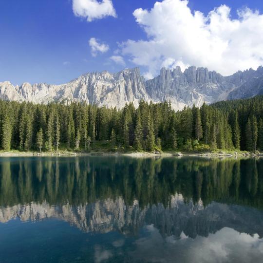 Be dazzled by Lake Carezza’s rainbow of colours