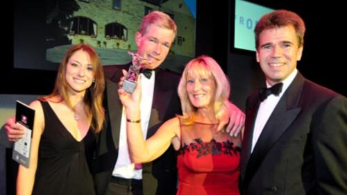 Andrew and Jayne ( centre ) receiving their White Rose Award
