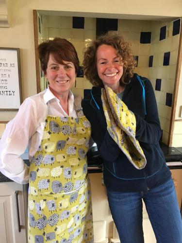 Sara with Kate Humble cooking breakfast
