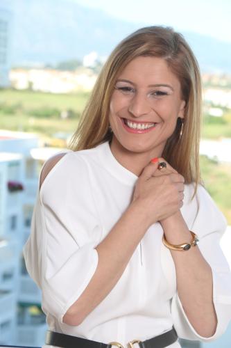 Anna. Greets all the guests personally.